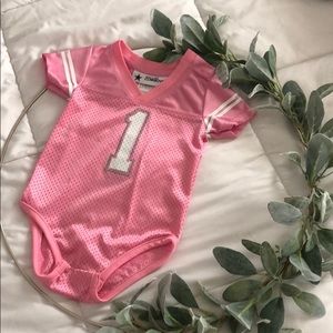 Pink Dallas cowboys onesie